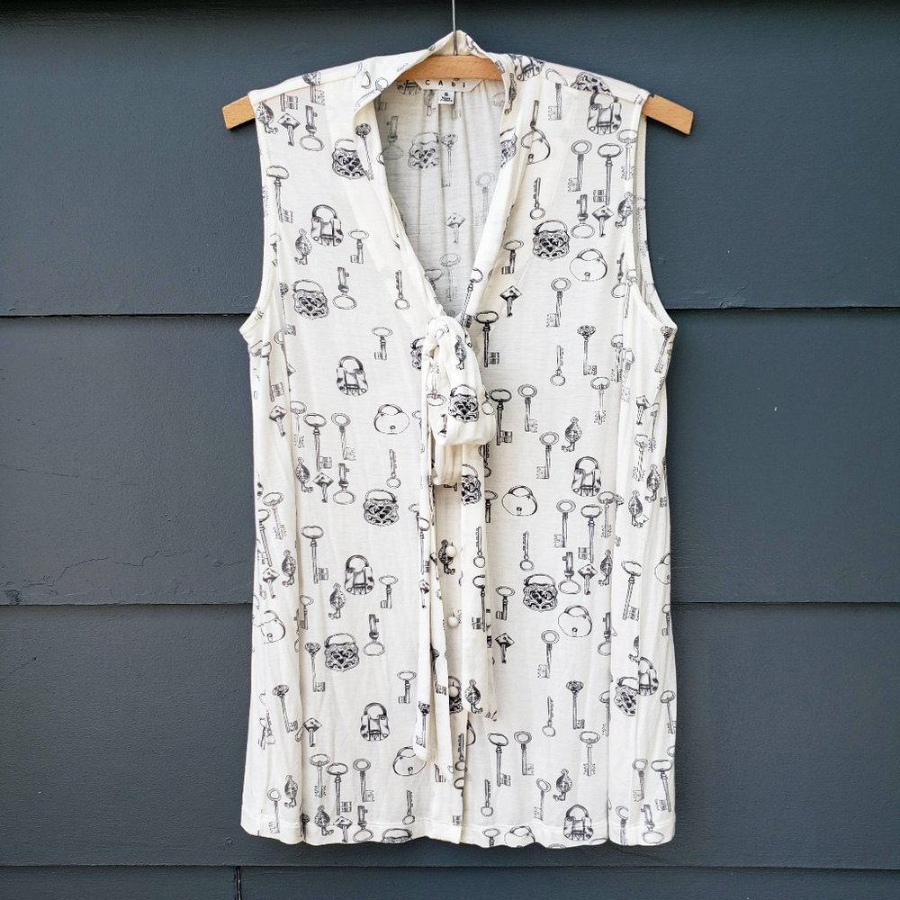 Cabi Keys Please Cream Print Bow Sleeveless Blouse - Picture 2 of 10